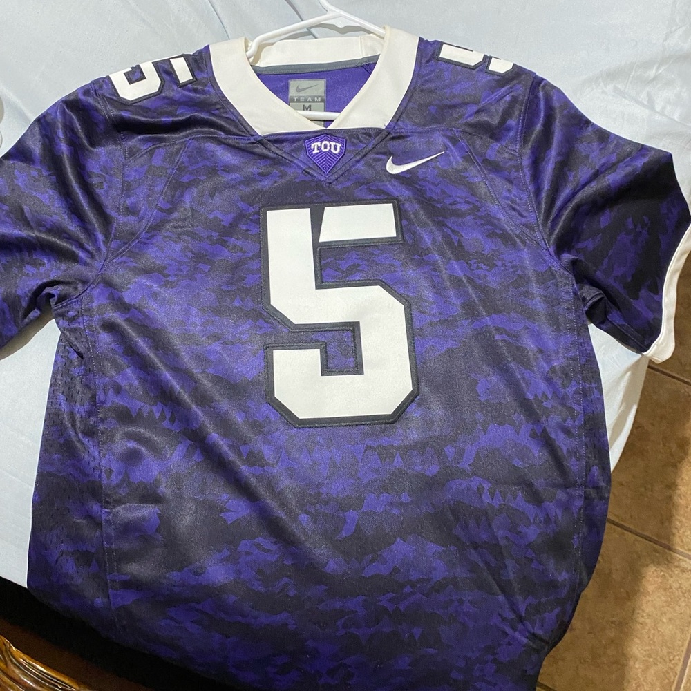 TCU FOOTBALL JERSEY, medium but fits loose. Worn 2 times.